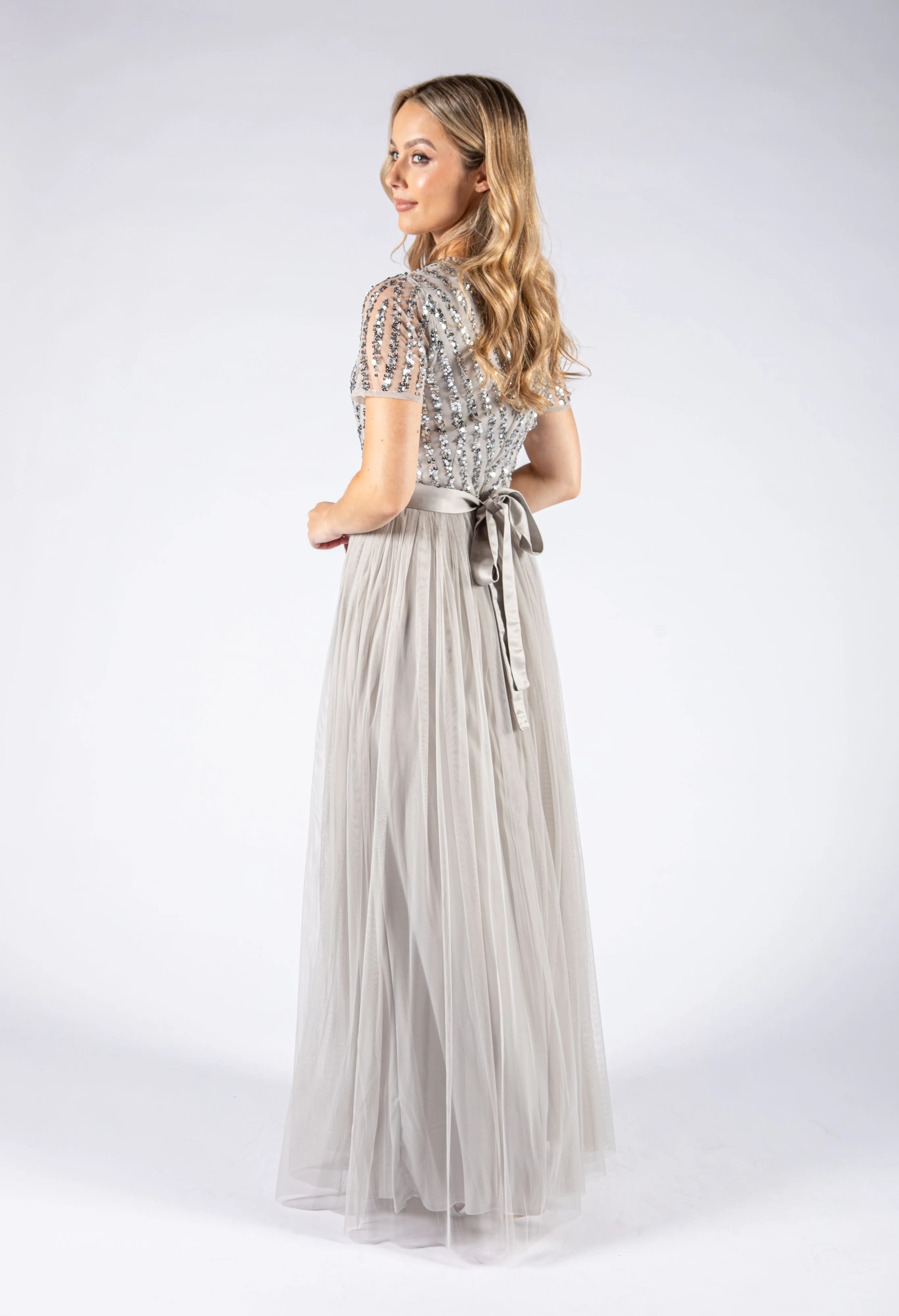 SOFT GREY V NECK SEQUIN AND TULLE DRESS WITH TIE WAIST - Image 3